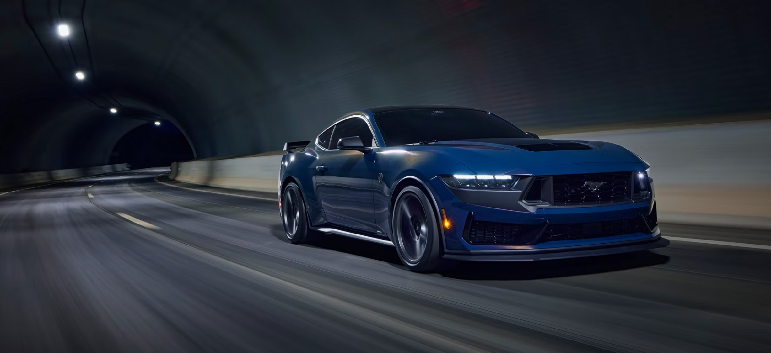 New 2026 Ford Mustang Dark Horse in a tunnel at night near Parkersburg, WV